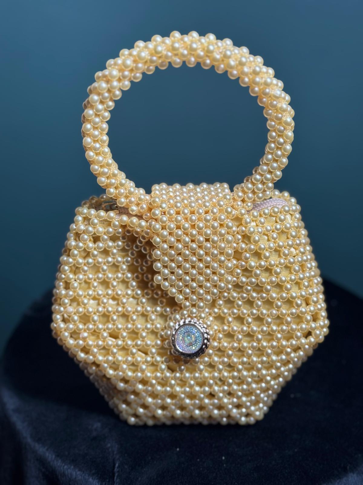 The "Ajike" Top Handle Bag